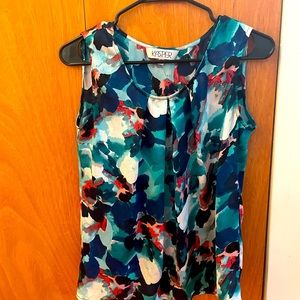 XS multicolored blouse perfect for the office! Never worn.